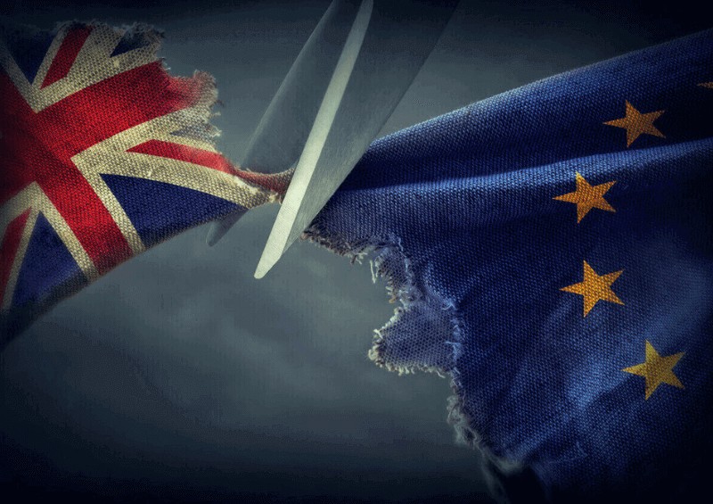 Brexit image of UK and EU flag being cut