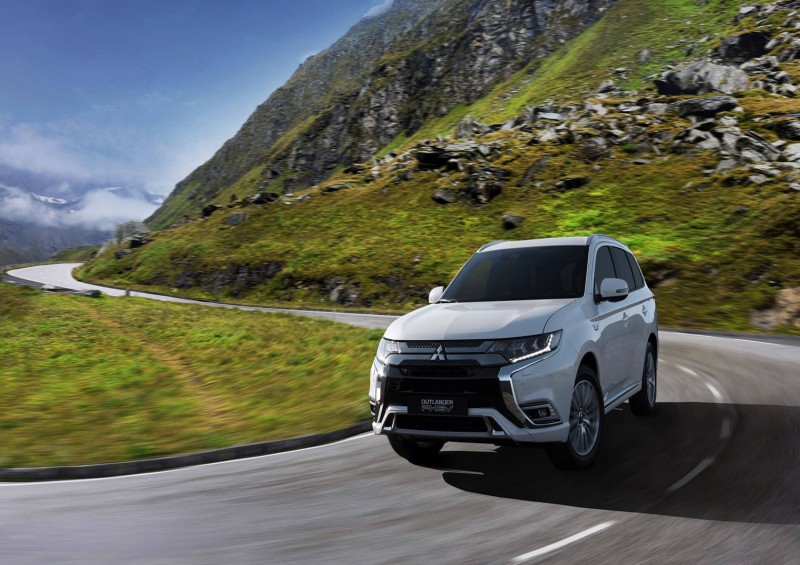 Mitsubishi Outlander PHEV on winding country road