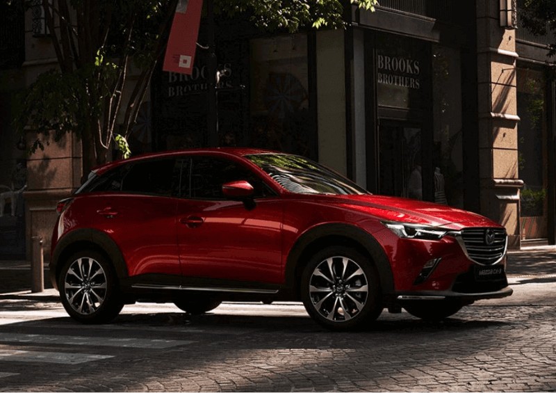 Side view of the red Mazda CX 3