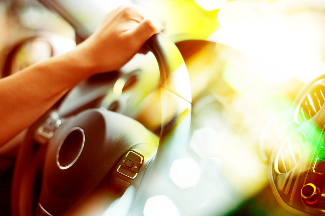 Driving a car in the sun