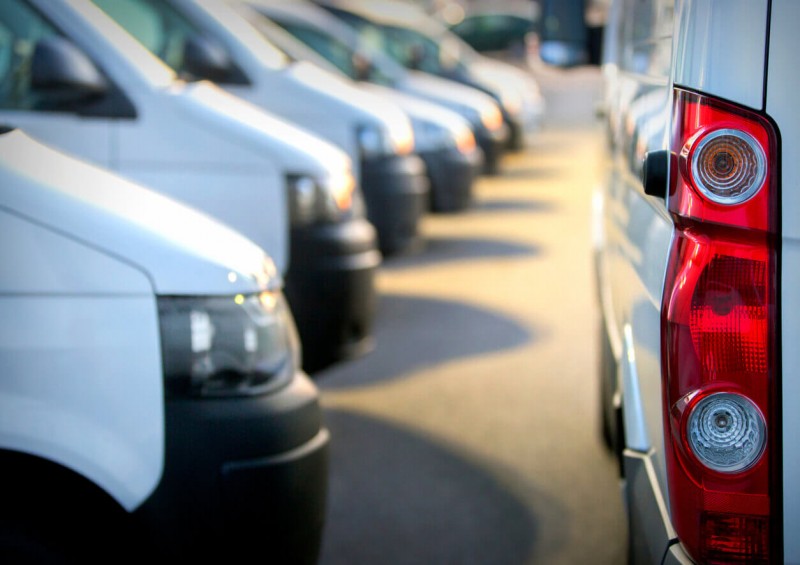 A row of white vans