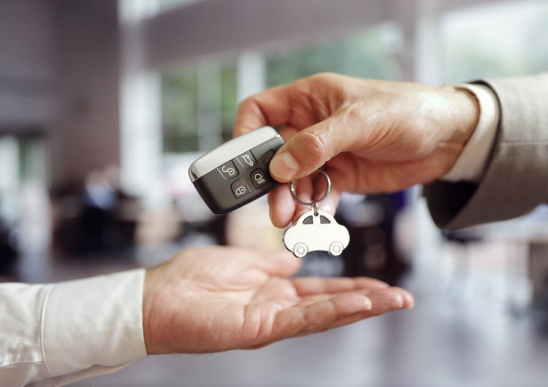 Car keys being given to customer