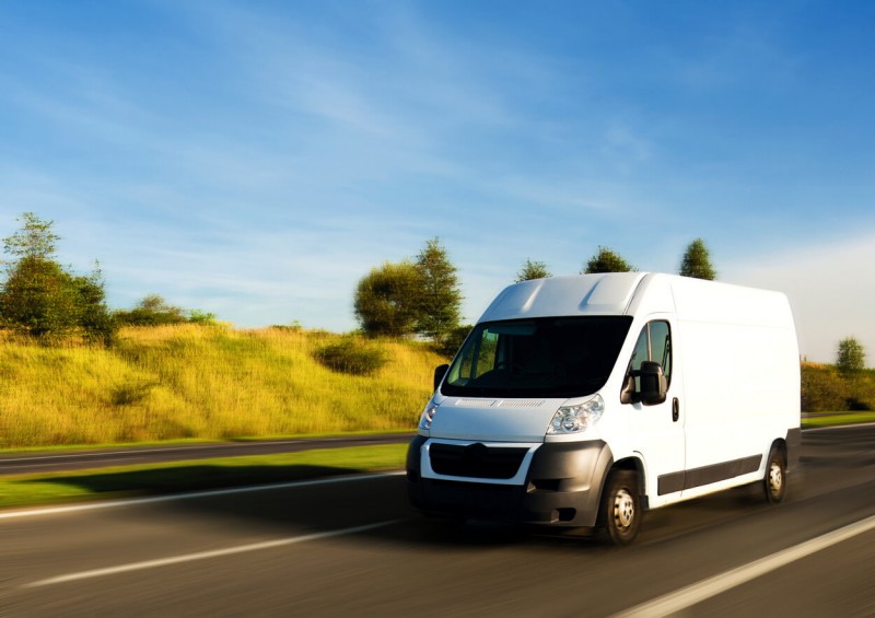 New white van being driven on the motorway