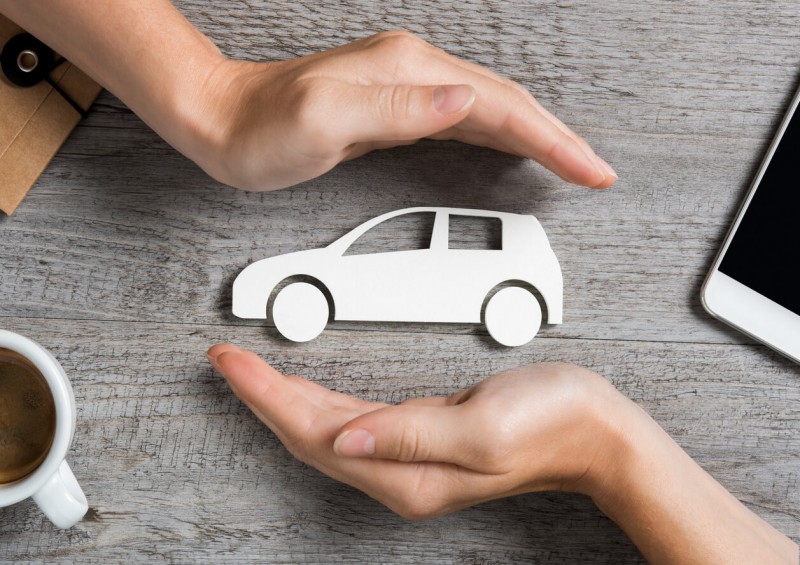 Paper car on work desk