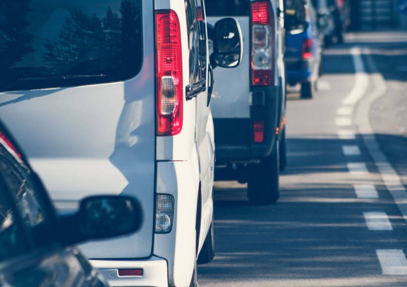 Vans on the left side of road