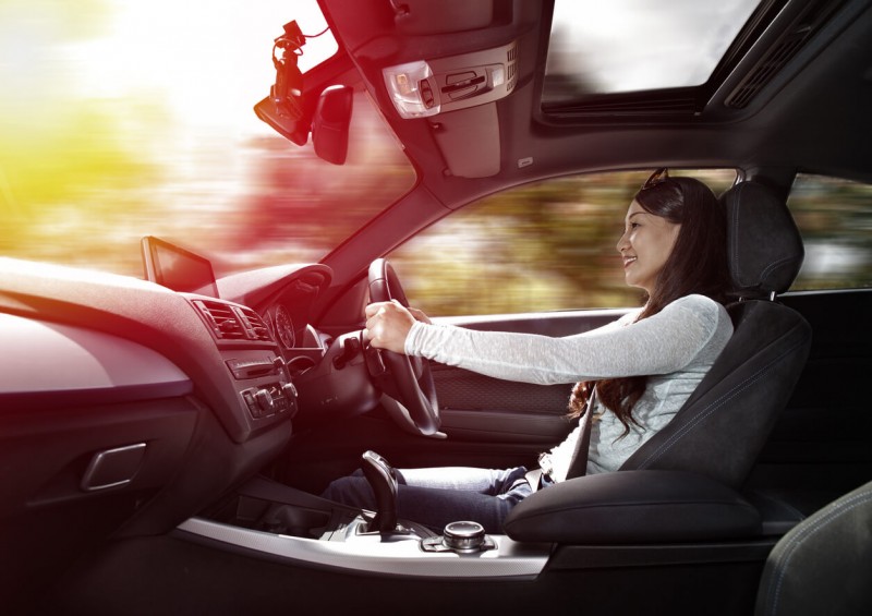 woman driving a new car